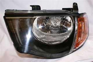 SEMIOPTICA IZQ MITSUBISHI L200 4WD 06 (ELE) DEPO